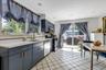 Eat in Kitchen with SS Appliances and Sliders to Deck