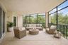 Virtually staged covered and screened lanai