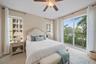 Virtually staged Bedroom 2 with small Juliette Balcony