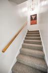 Stairway to the Primary Bedroom with a Balcony over looking the outstanding view