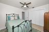 Bedroom 3 w/ Terrazzo flooring