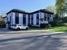 Prominent front exterior/parking view.