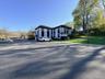 Spacious paved parking area.