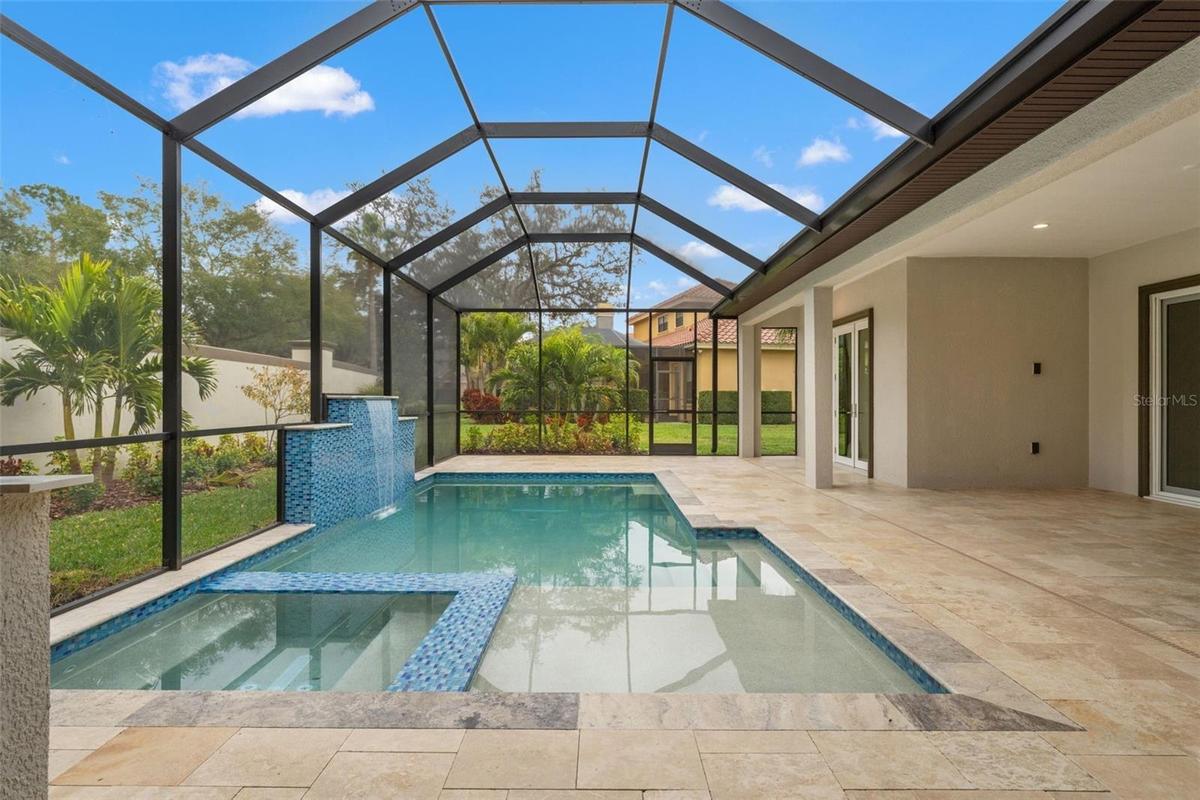 Gorgeous Pool/spa with Travertine stones.