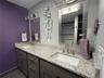 Dual sinks & mirrors. Good storage space. You'll love this renovation!