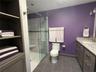 All the right touches, including convenient storage for towels.