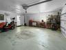 Access from big laundry room to garage. Reinforced garage door.