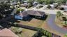 Aerial view of big back yard. Room for a pool or caged hot tub if you wish.