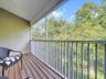 3rd floor screened patio off of primary