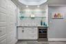 Dry Bar area with wine refrigerator
