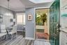 Dining area & entrance to condo