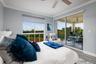 Primary Bedroom with sliders to  Private Balcony