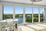 Spacious high impact glass enclosed balcony on the 8th floor with expansive Intracoastal waterway views.