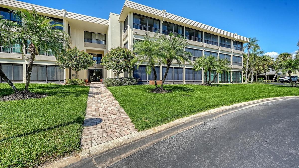 The entrance to 225 Hourglass Way, known as the Sunset House building.