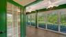 A set of French doors opens to the lagoon facing lanai.
