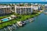 Boat slip with lift included! Located directly on the wide-open waters of the Intracoastal Waterway, right in the heart of Treasure Island and just ac