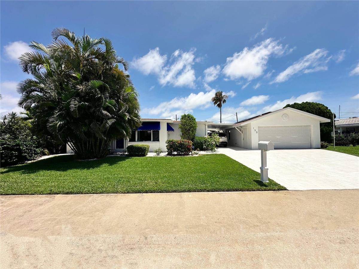 Two stall garage and a carport