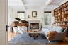 Living area featuring beam ceiling, a healthy amount of sunlight, and coffered ceiling