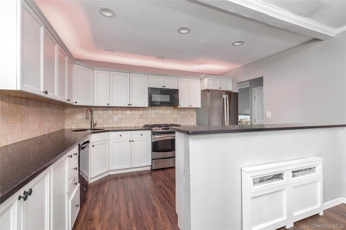 Gorgeous Kitchen with abundant storage and counter space