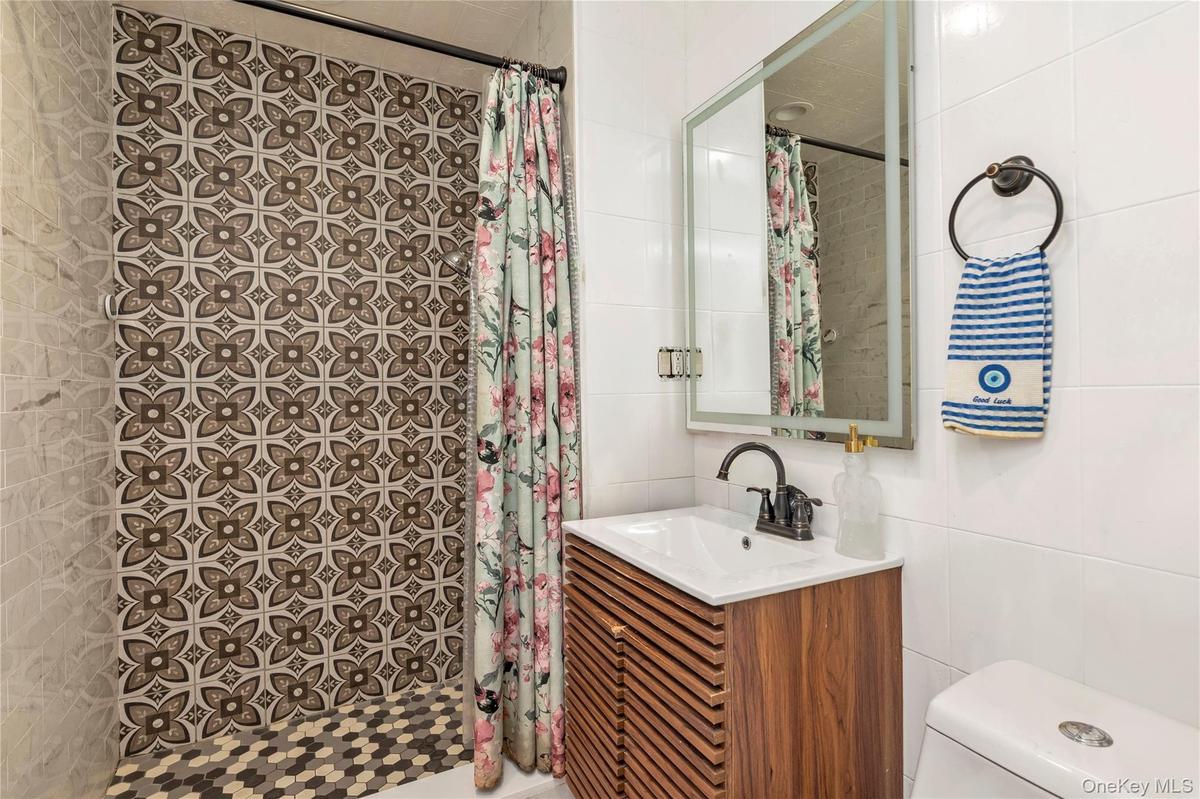 Custom titles primary bathroom with shower