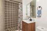 Custom titles primary bathroom with shower