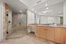 Spa-like primary bathroom with separate shower and tub