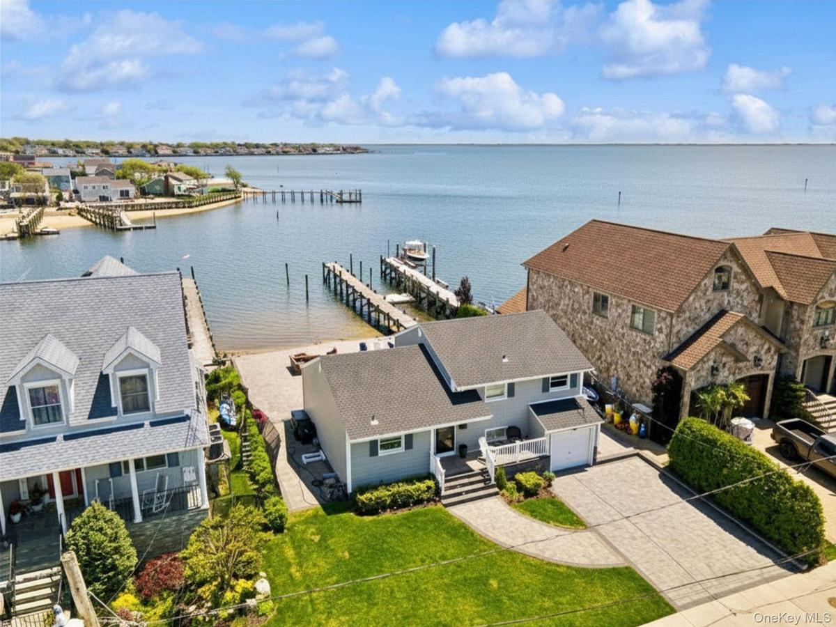 Only One Home Down From Open Bay Front