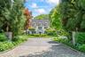Long circular driveway leading to the entrance of house