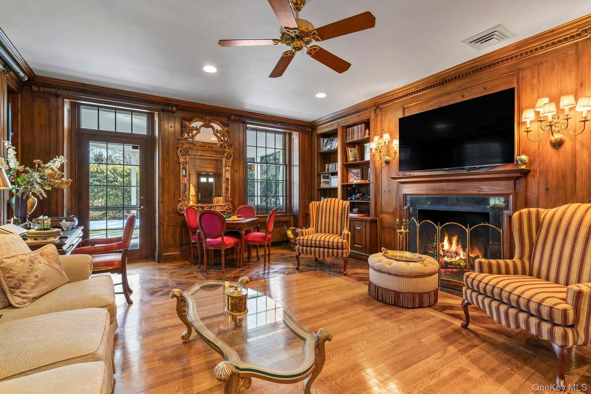 Library with wood burning fireplace