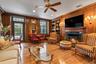 Library with wood burning fireplace