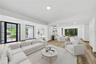 Living Area - This image has been virtually staged and does not reflect the current state of the property.