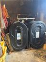 Connected oil tanks housed in Super's workroom