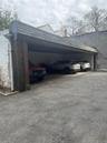 One of two carports in the private back area of building