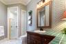 Another spacious bathroom right off a bedroom.