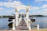 Pergola entry way greets you down the dock