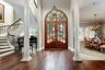 Spacious entry welcomes your guests. Formal dining and living room right off the kitchen and spiral staircase lead to the upper floor, loft, bedroom a