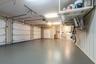 Oversized 3 car garage with more storage space and side entry from the house.