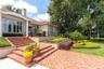 Generous use of St. Louis brick, wood flooring, and wrought iron artistry.