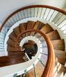 Every sense is tickled in this architectural wonder. Views of spiral woodworking or custom wrought iron, custom volume windows and ceiling, crown mold