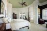 Stunning pool and water views from your expansive master bedroom/ sitting room.