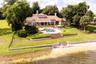 Spectacular grounds and luxury home, and this can all be yours. You can even build a sandcastle on your private beach.