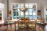 SUN DRENCHED lighting pours in as it illuminates this custom home.