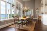 CUSTOM-BUILT with HIGH-QUALITY finishes and fixtures, molding and windows that enhance the architectural elegance.
