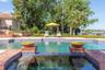 Relax in your spa and soak in this exquisite property and grounds.