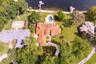 CUSTOM BUILT SHOWPLACE is nestled back on a LUSH, PRIVATE ENCLAVE oversized flag lot of *4.08-Acres *Over 1 + acres for residence.