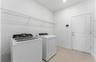 Laundry Room w/Whirlpool Washer and Dryer