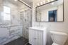 Bathroom featuring a glass-enclosed shower.