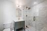 Bathroom featuring a glass-enclosed shower.