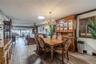 Expansive dining and living areas transition naturally to the waterfront views, perfect for everyday comfort or entertaining guests.