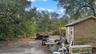 Horse area behind large storage shed